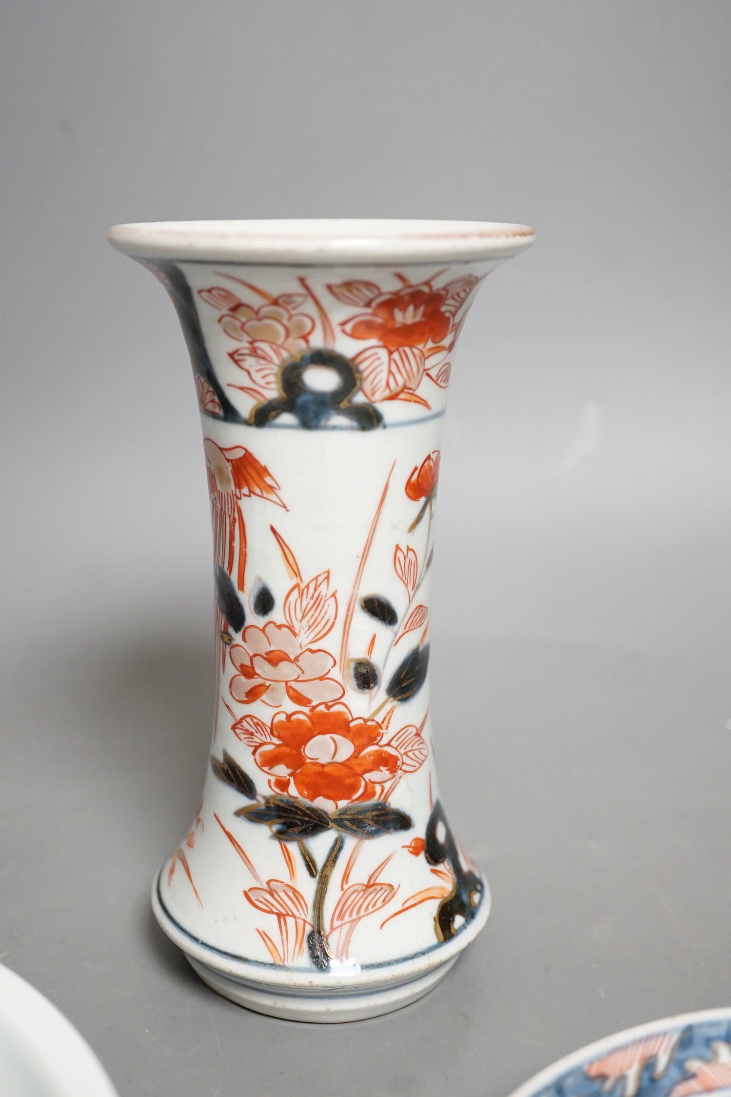 An 18th century Japanese Arita porcelain vase, a Nabeshima style dish and an Arita dish, height of vase 17cm